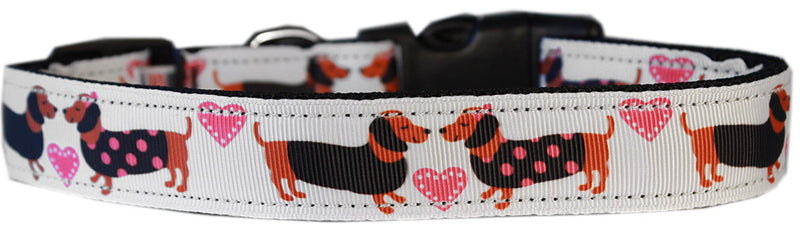 This 3/8" wide cat collar is made of durable nylon with a high quality ribbon overlay.  It includes a buckle specially designed to break away in the event that your cat becomes entangled while wearing it.